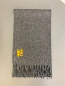 a picture of the yellow logo High School of Dundee scarf