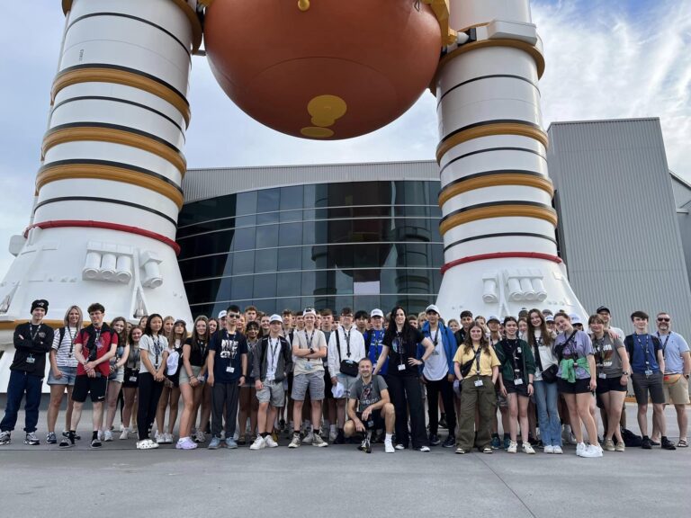 SENIOR SPACE TRIP Discovery - FB Florida trip. Pupils on school trip standing in front of the Camp Kennedy Space Center .