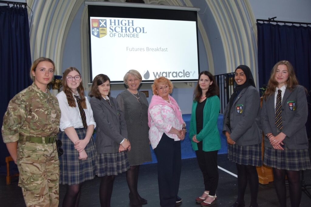 WORK EXPERIENCE SECTION waracle ladies. Associates, pupils and staff taking group photo.