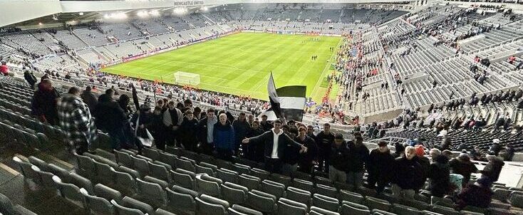 Amazing Football Experience For HSD Pupils. Pupils in the terrace part of stadium of football grounds. Posing for group photo.