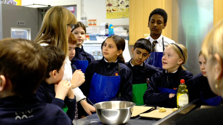 L7 pupils in Health & Food Technology class with Senior Years teacher