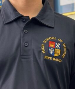 Adult Dri Fit Polo Shirt complete with Pipe Band Logo